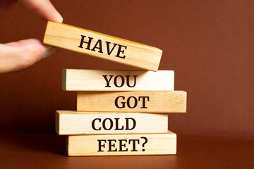 Wooden blocks with words 'Have you got cold feet?'.