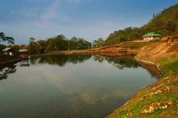 Obraz premium Home stay at Chayatal or Chaya Taal, West Sikkim, India, Nature, silence and peace. Famous for Reflection of snow-capped Mount Kanchenjunga and Kabru on lake water, Himalayan mountains surrounding.