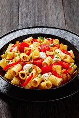 pepper tomato mozzarella pasta salad in bowl