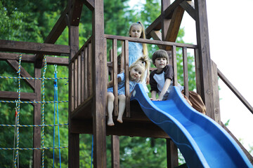 Obraz premium Children walk in the summer in nature. Child on a sunny spring morning in the park. Traveling with children.