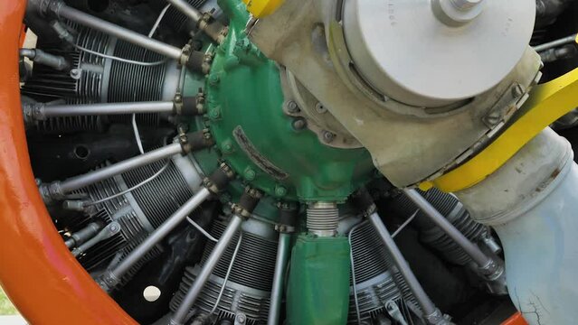 Engine and propeller of a small aircraft. 9-cylinder radial air-cooled aircraft engine. Close-up of the engine of an old propeller plane