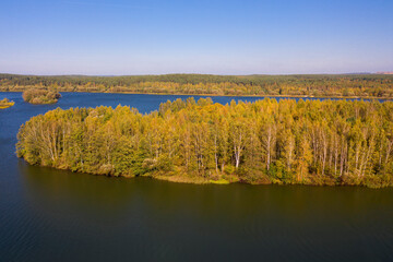 An aerial panoramic view on an autumn lake