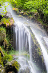 Detail of a waterfall with photographic silk effect. Long exposure.