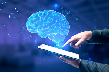 Innovation technologies, ai, artificial intelligence and science concept with businessman using digital tablet on digital blue human brain symbol background