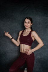 Fototapeta na wymiar Attractive fitness woman wear sport cloth bra posign at studio, isolated