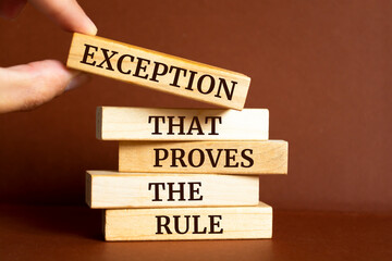 Wooden blocks with words 'Exception that proves the Rule'.