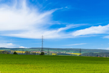Fototapeta na wymiar Summer landscape, with fields and blue sky. European countryside.