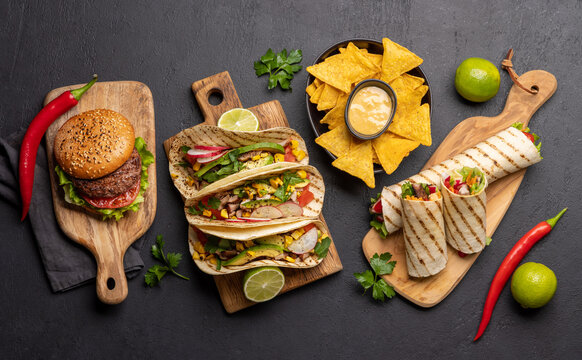 Mexican food featuring tacos, burritos, nachos, burgers