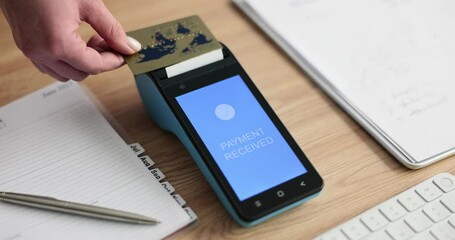 Closeup of woman hand holding credit card and approved payment. Cashless payment method