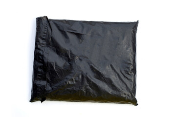 Fototapeta premium Black plastic envelope on white background.