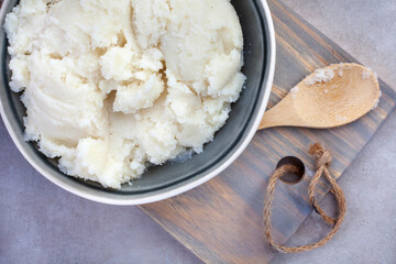 Traditional South African pap or maize meal on wood and mottled grey 