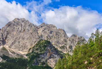 Fototapeta na wymiar Prisojnik (or Prisank 2547 m, left) and Mali Prisojnik (2215 m, right) in Julian Alps (Slovenia) from the hiking trail to Špik. 