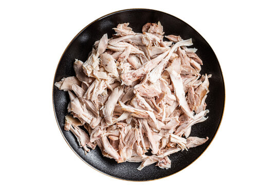 Shredded chicken meat in a plate. Isolated, transparent background.