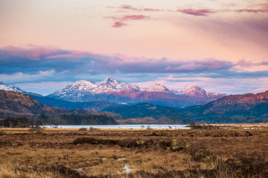 UK, Scotland, Loch Shiel at dusk with mountains in background