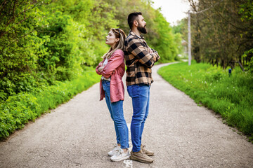 Obraz premium Couple is having difficulties in their relationship. They are both offended and angry. Conceptual image.