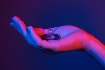 Condom ready to use in female hand. Contraception. Condom safe sex concept prevent infection....
