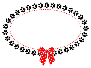 Oval decorative frame with black animal paws and a red bow polka dots.