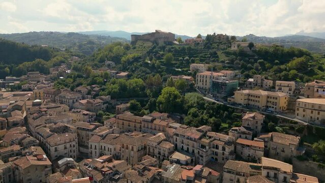 This aerial drone video shows the city of Cosenza. Cosenza is the capital of the province Calabria in Italy. Cosenza has beautiful old buildings in the historic city center.