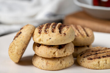 Cocoa cookies. Delicious cookies on dark background. Close up