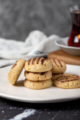 Cocoa cookies. Delicious cookies on dark background. Close up
