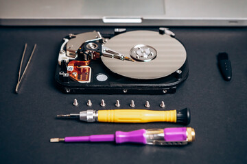 Computer disassembled HDD hard drive data disc SSD, backup part of the PC or laptop. Recovery,...