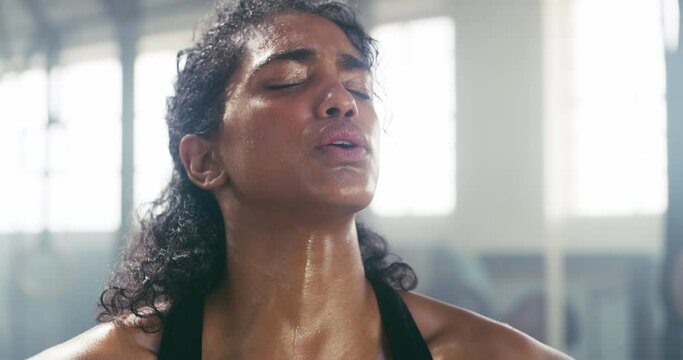 Thinking, sweating and breathing with woman in gym for workout, cardio and performance. Exercise, health and training with female athlete in fitness center for strong, exhausted and tired