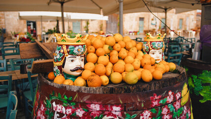 Fresh orange fruit with moro head in a restaurant of Sicily