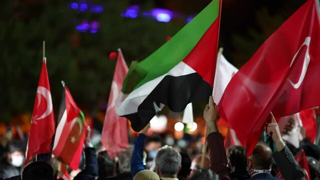 Jerusalem protestants holding up the flag