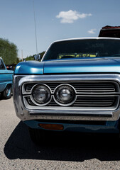 Obraz na płótnie Canvas Part of old blue car close up.