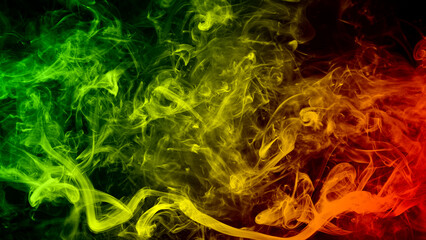 abstract background smoke curves and wave reggae colors green, yellow, red colored in flag of...
