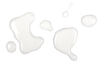 Spilled milk puddle isolated on white background and texture, top view - obrazy, fototapety, plakaty