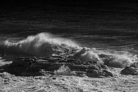 Dramatic landscape in black and white of the Costa Brava on a day with Tramontana wind in the province of Girona in Spain