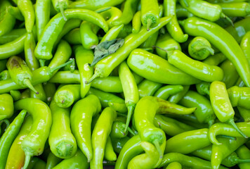 Green chilli close-up. Fresh Vegetables Background. Chili peppers.
