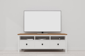 TV room. A TV with a blank white screen stands on a TV cabinet. TV furniture. TV mockup in a bright room. 3d render.