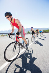 Fototapeta premium Cyclists in race on rural road