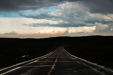 Wide Open Road After a Storm at Sandhills of north-central Nebraska