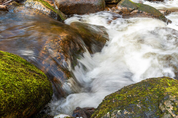 Harz's Flowing Symphony: Long Exposure of a Wild River Embraced by Rocks