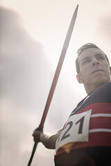 Track and field athlete holding javelin
