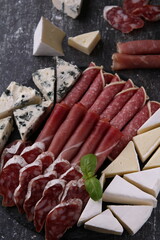 photo different types of meat and cheese