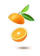 Orange fruit with green leaf levitate in the air isolated on white background