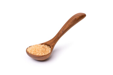 Brown sugar in wooden spoon isolated on white background with clipping path.