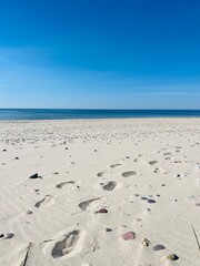 Blue seascape, white sand beach, wild beach, blue sea and blue sky 