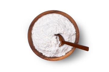 Closeup sugar powder in wooden bowl with spoon isolated on white background. Top view, flat lay