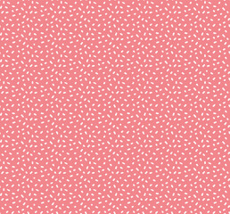 Seamless pattern with dotted circles. Stylish background with randomly disposed spots. Simple texture from small white dots on red background.
