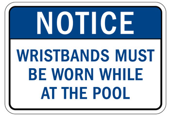 Pool pass required sign and labels wristbands must be worn while at the pool