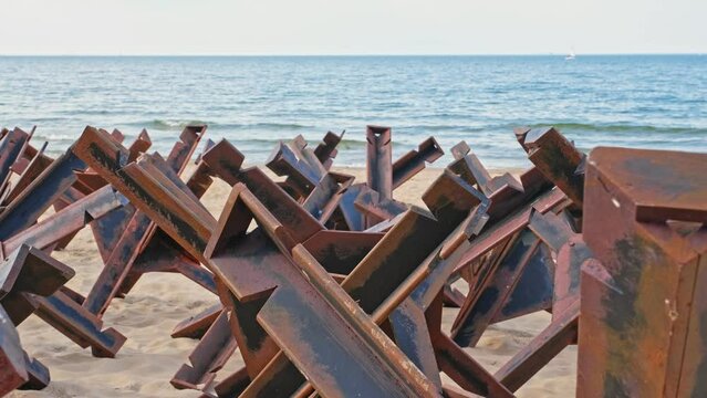 Military Defensive Anti Tank Infantry Metal Obstacles Preventing Sea Invasion Landing Deployed on Beach