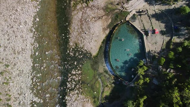 Benja Thermal Baths in Permet, Albania, offer an amazing retreat for relaxation, where visitors can unwind and rejuvenate in the soothing waters, surrounded by breathtaking natural beauty atmosphere