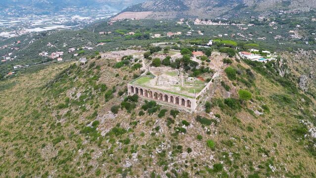 This aerial drone video shows the tempio di giove anxur in Terracina, Italy. The old temple is located on the mountain and has a beautiful view over the sea. 