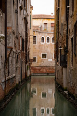 Fototapeta na wymiar Venice canal without people and gondolas