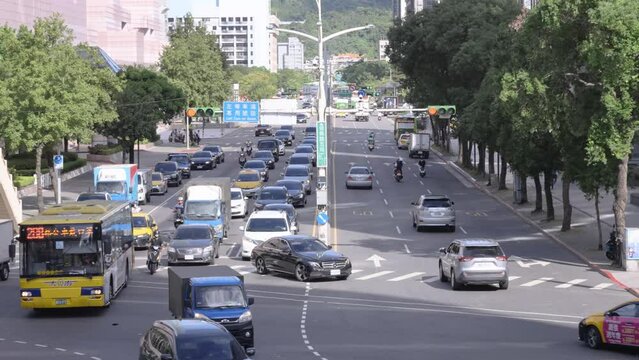 The intersection in Xinyi District, Taipei, Taiwan is full of traffic